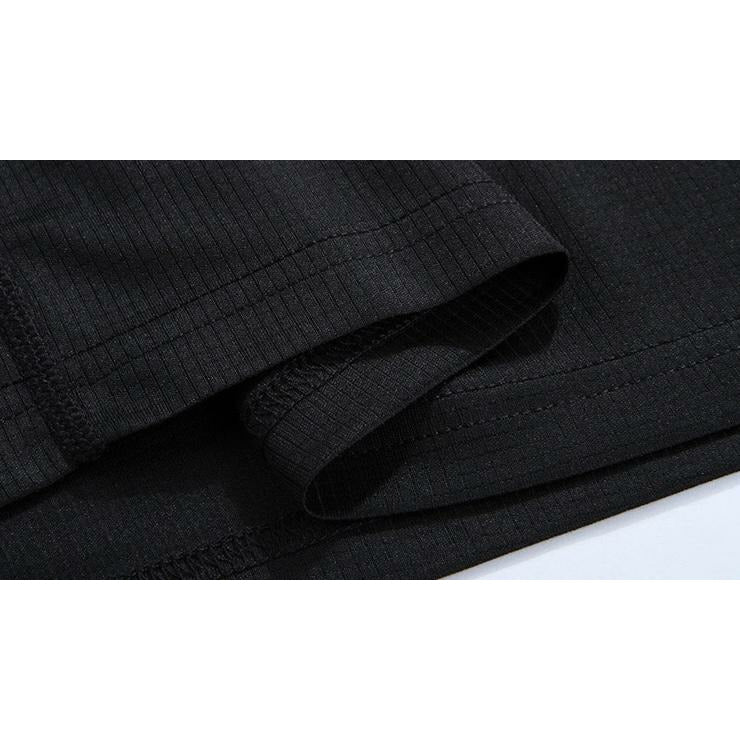 Close up of hem and stitching of activewear shirt quick dry material